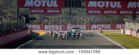 VALENCIA, SPAIN - NOV 13: Moto3 race during Motogp Grand Prix of the Comunidad Valencia on November 13, 2016 in Valencia, Spain.