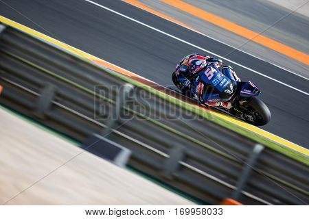 VALENCIA, SPAIN - NOV 12: Mattia Pasini in Moto2 practice during Motogp Grand Prix of the Comunidad Valencia on November 12, 2016 in Valencia, Spain.
