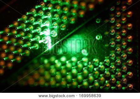 High contrast close-up shot of CPU contacts legs