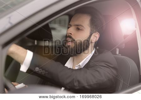 Businesmen driving carefuklly 