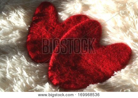 Valentine lie on soft fluffy white cloth with a nap