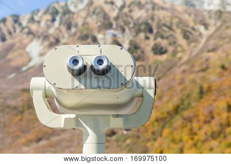 Tourist binocular at outdoor landscape