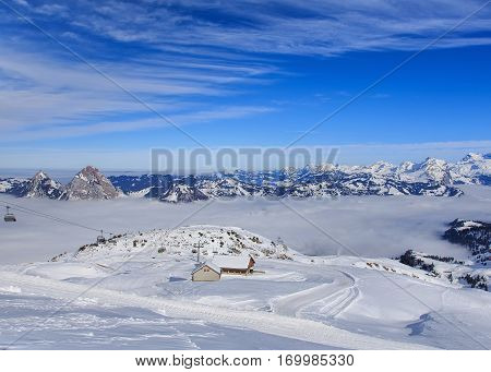 Mt. Fronalpstock, Switzerland - 24 January, 2017: wintertime view from the summit of the Fronalpstock. The Fronalpstock is a mountain in the Swiss canton of Schwyz, it has an elevation of 1,921 meters above sea level.