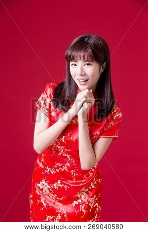 Beauty Woman Wear Cheongsam And Smile To You In Chinese New Year