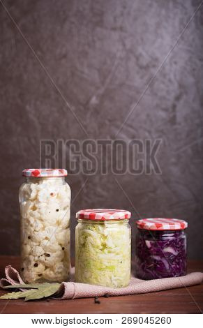 Sauerkraut In A Blue Bowl On A Wooden Table