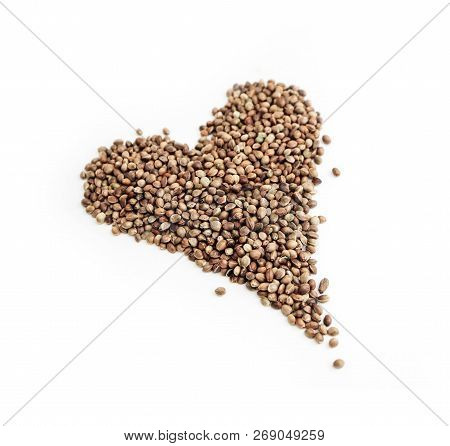 Cannabis Seeds Isolated On White Background. Marijuana Grains, Herbal Health Treatment, Heart Shape.