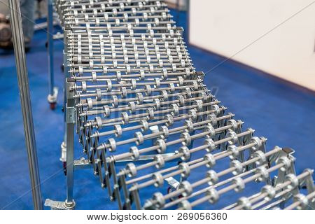 Flexible Adjustable Roller Conveyor. Poratable Innovative Products Transportation Technology For Fac