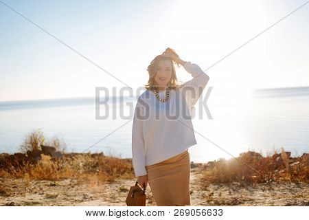Woman Expecting A Baby Feeling Happy During A Walk