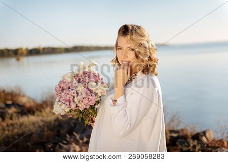 Pregnant Woman Received The Bunch Of Flowers From Her Partner