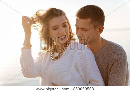 Happy Young Family Expecting The First Baby