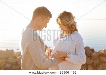 Man And A Woman Preparing To Become Parents Soon