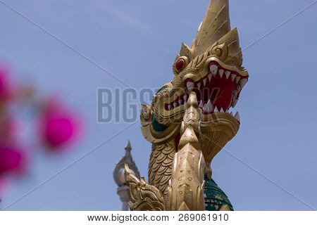 Gold Dragon Head On Stairs To Buddhist Temple