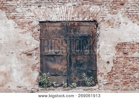 Old Red And White Brick Wall Urban Texture Background And Metal Door
