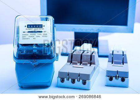 Circuit Breakers And Power Meters On The Background