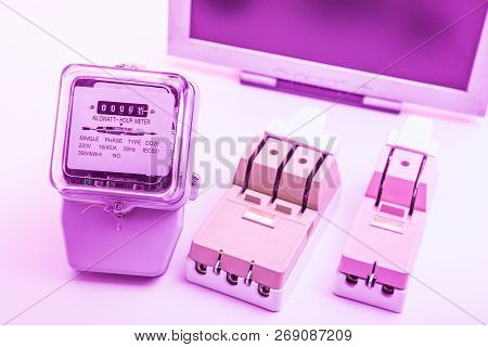 Circuit Breakers And Power Meters On The Background