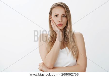 Girl Looking At Problem Trying Think Up Plan Solve It, Folding Lips Dreamy And Thoughtful Holding Ha