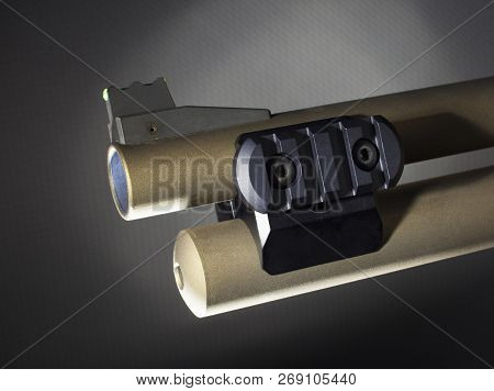 Adapter Designed To Hold A Rail And Weaponlight On A Shotgun
