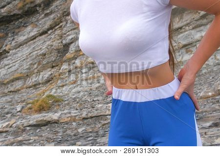 Flat Belly Girl During Breathing Exercises Bodyflex. Belly Close-up View.