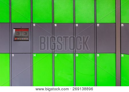 Outdoor Green Automated Public Lockers With Touchscreen Display. Autonomous Post Parcel Terminal.sel