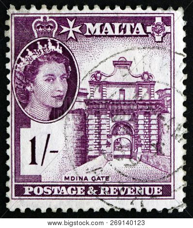 Malta - Circa 1956: A Stamp Printed In Malta Shows Mdina Gate, Is The Main Gate Into The Fortified C