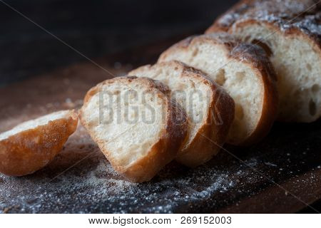 Close Up Of Batard Au Levain On Wood Plate