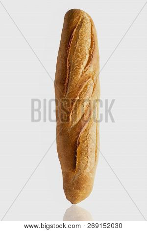 Batard Au Levain On Wood Plate Isolate On White