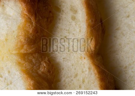 Close Up Of Batard Au Levain On Wood Plate
