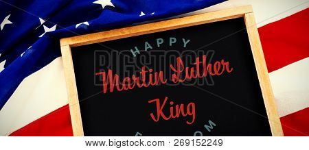 happy Martin Luther King freedom against blank slate on national flag