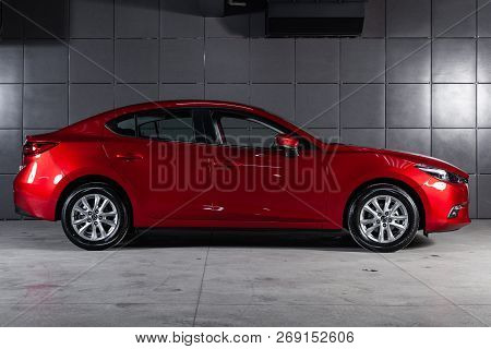 Novosibirsk, Russia - November 16, 2018: Mazda 3, Side View. Photography Of A Modern Car On A Parkin