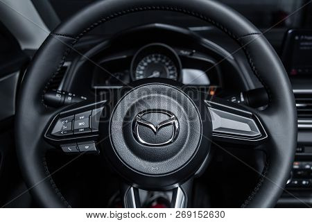 Novosibirsk, Russia - November 16, 2018: Mazda 3, Close-up Of The Dashboard And Steering Wheel. Phot