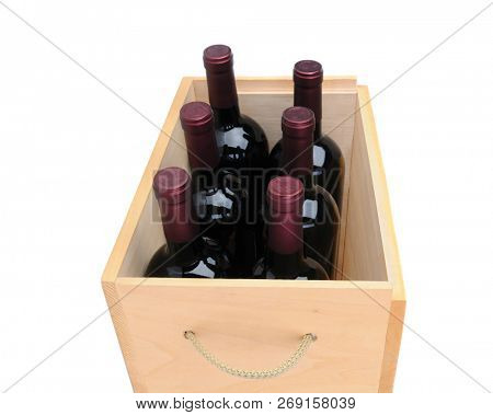 Closeup of six Cabernet Sauvignon wine bottles in a wooden crate  isolated on white.