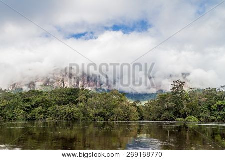 River Carrao And Tepui Table Mountain Auyan In National Park Canaima, Venezuela