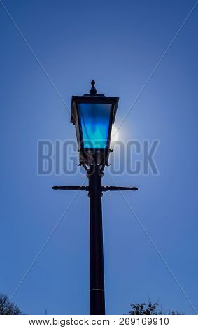 Sun That Halps Lantern To Light In City