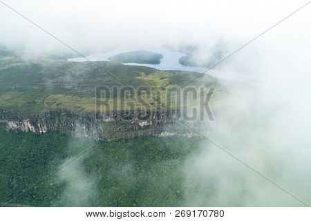 Aerial View Of River Caroni And One Of The Tepuis Table Mountains In Venezuela