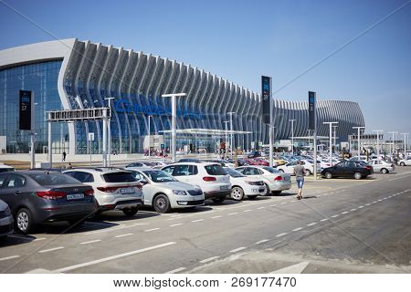 SIMFEROPOL, CRIMEA - JUN 7, 2018: New modern building of International Airport and parking. Simferopol International Airport is located 17 km north-west from the center of Simferopol.