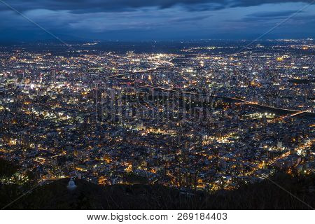 Mount Moiwa, Hokkaido, Japan- October 2018; Night View Of Sapporo City During Autumn Season With Lon