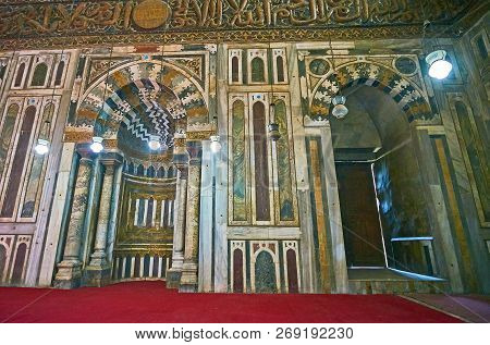 Cairo, Egypt - December 21, 2017: The Mihrab Of Sultan Hassan Mosque-madrasa Is Decorated With Gilt 