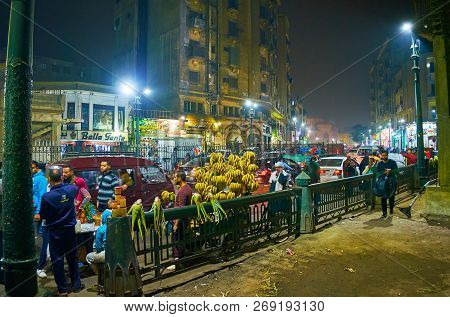 Cairo, Egypt - December 21, 2017: The Busy Evening Al Azhar Avenue With Heavy Traffic, Chaotic Pedes