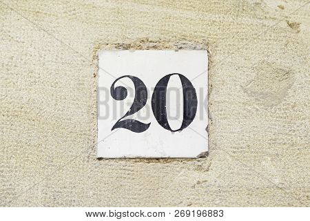 Number Twenty On The Wall, Detail Of A Number Of Informaicón In A House, A Figure