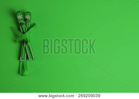 Christams Time Decoration Wood Ski On Green Backround. New Yaer