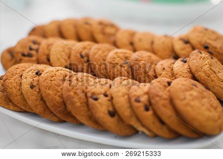 Cookies Americaner With Chocolate On Plate On Table Close Up