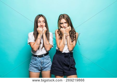 Scared Emotive Multiethnic Women Stare At Camera With Bewilderment, Keep Hands Near Mouthes, Notice 