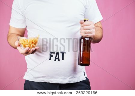 Overeating, Fast Food, Excess Food, Glutton, Alcohol Addiction, Junk Food. Fat Obese Man With Bottle