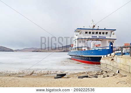 Irkutsk, Russia: April 10, 2018: Russain Boat For Crossing Baikal Lake Parks At The Pier In Winter