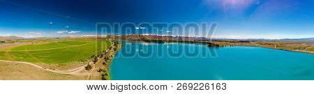 Lake Ruataniwha, New Zealand, South Island, trees and mountains, water reflections