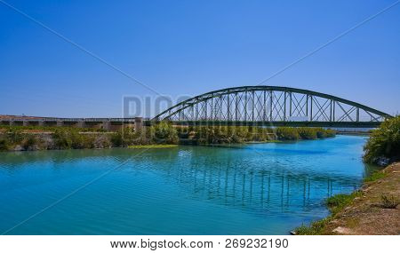 Xuquer Jucar river metal bridge in Fortaleny of Valencia at Spain