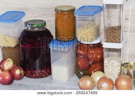 Storage Shelves In Pantry With Homemade Canned Preserved Fruits And Vegetables