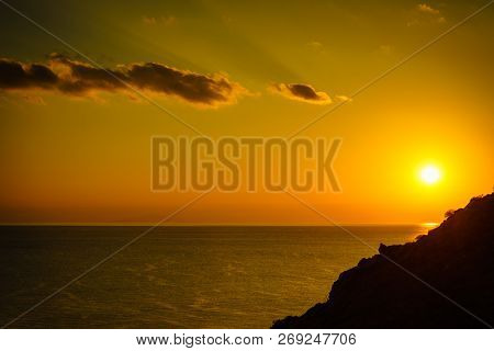 Red Orange Sunset Over Sea Water Surface, Greece