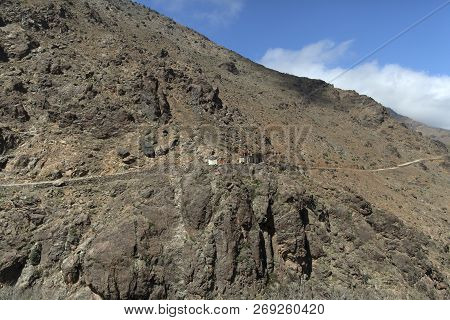 Hiking Route To Toubkal Mountain From Imlil On A Sunny Day With The Blue Sky Passing Via Improvised 