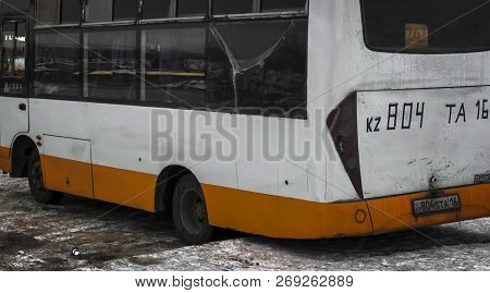 Kazakhstan, Ust-kamenogorsk, November 16, 2018: Chinese Bus At The Bus Stop. Dirty. Bus Fragment. Ab